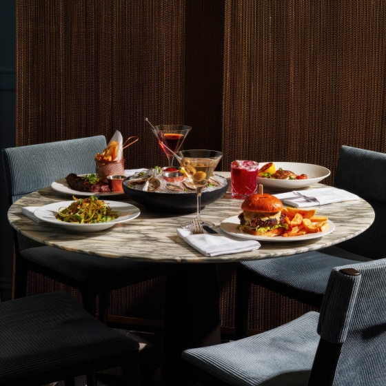 A table of assorted dishes and drinks.