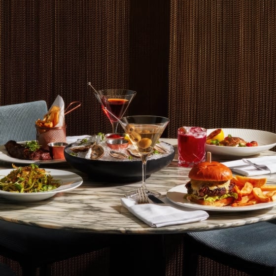 A table of assorted dishes and drinks.