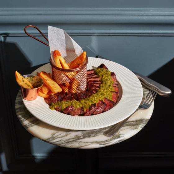 A steak and frites dish.