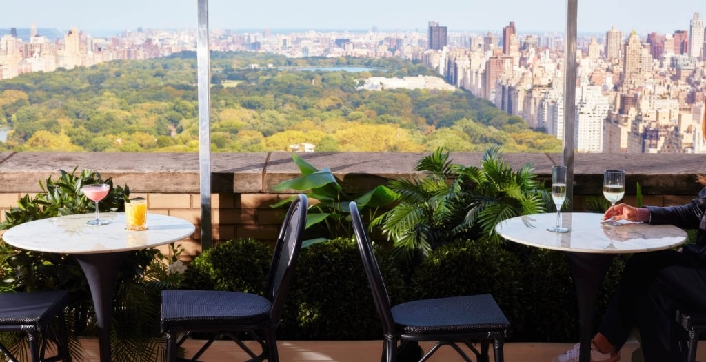 Two dining tables overlooking Central Park.