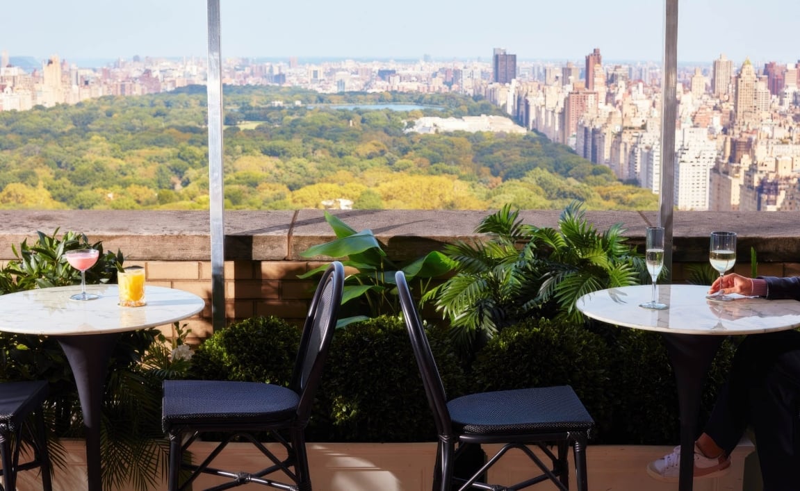 Two dining tables overlooking Central Park.