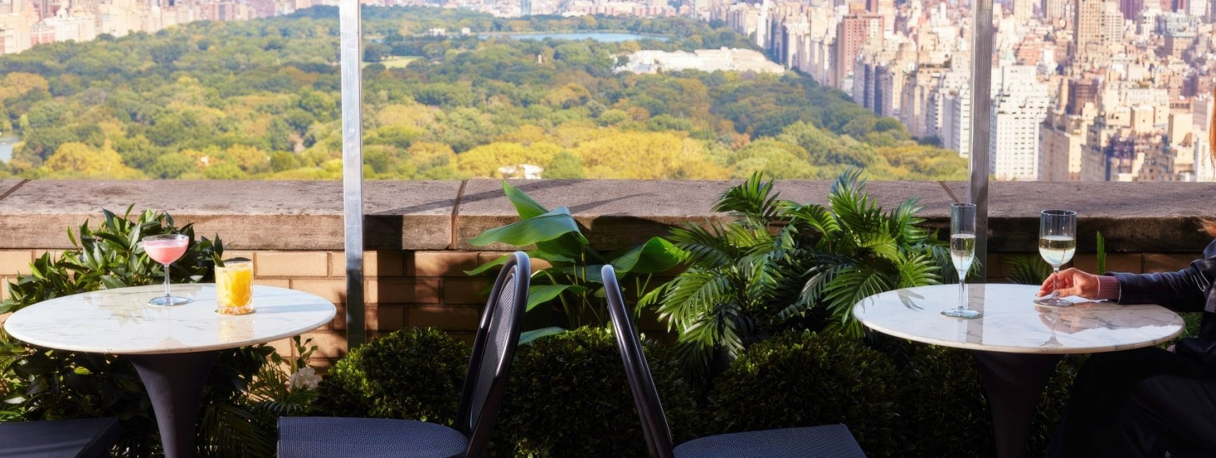 Two dining tables overlooking Central Park.