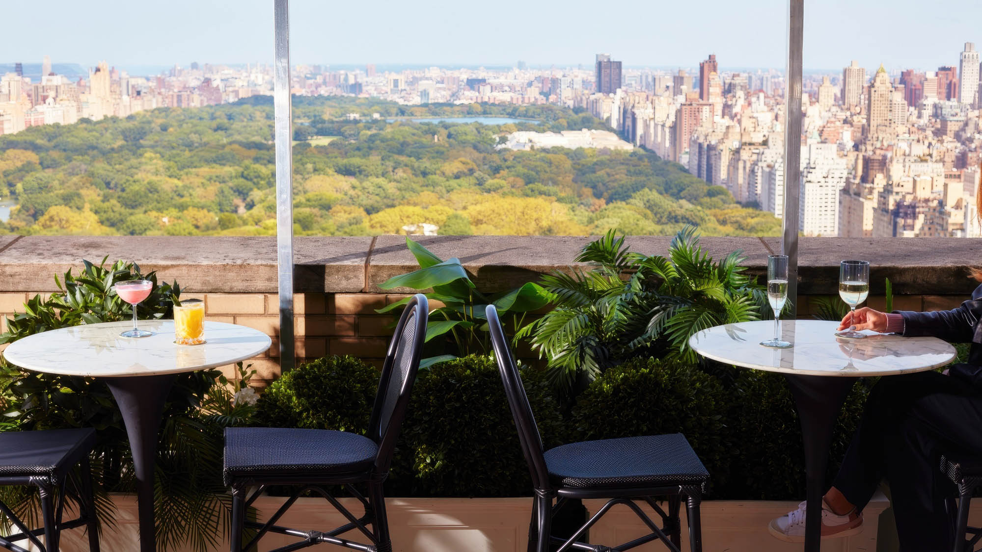 Two dining tables overlooking Central Park.