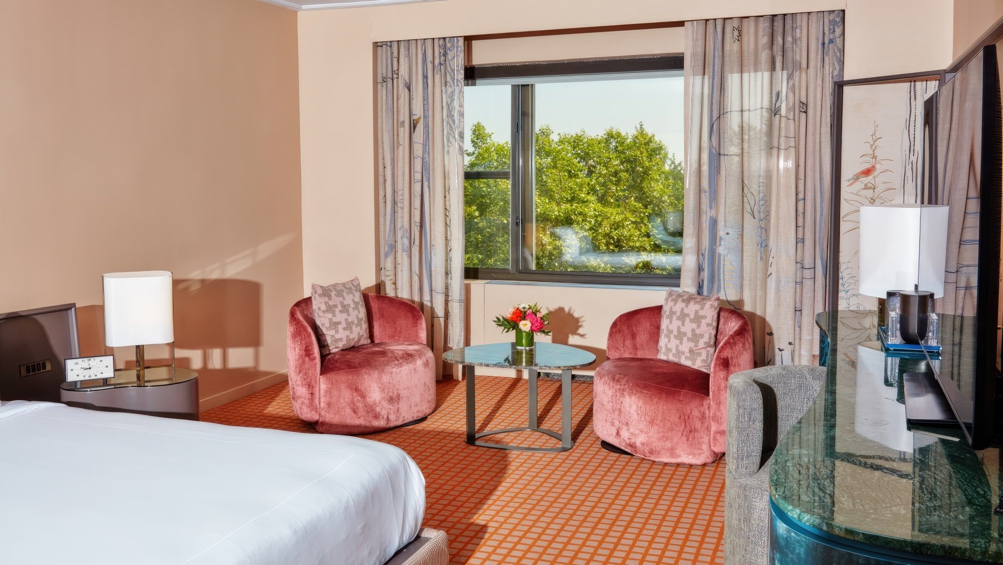 A small seating area in a room at Park Lane New York.