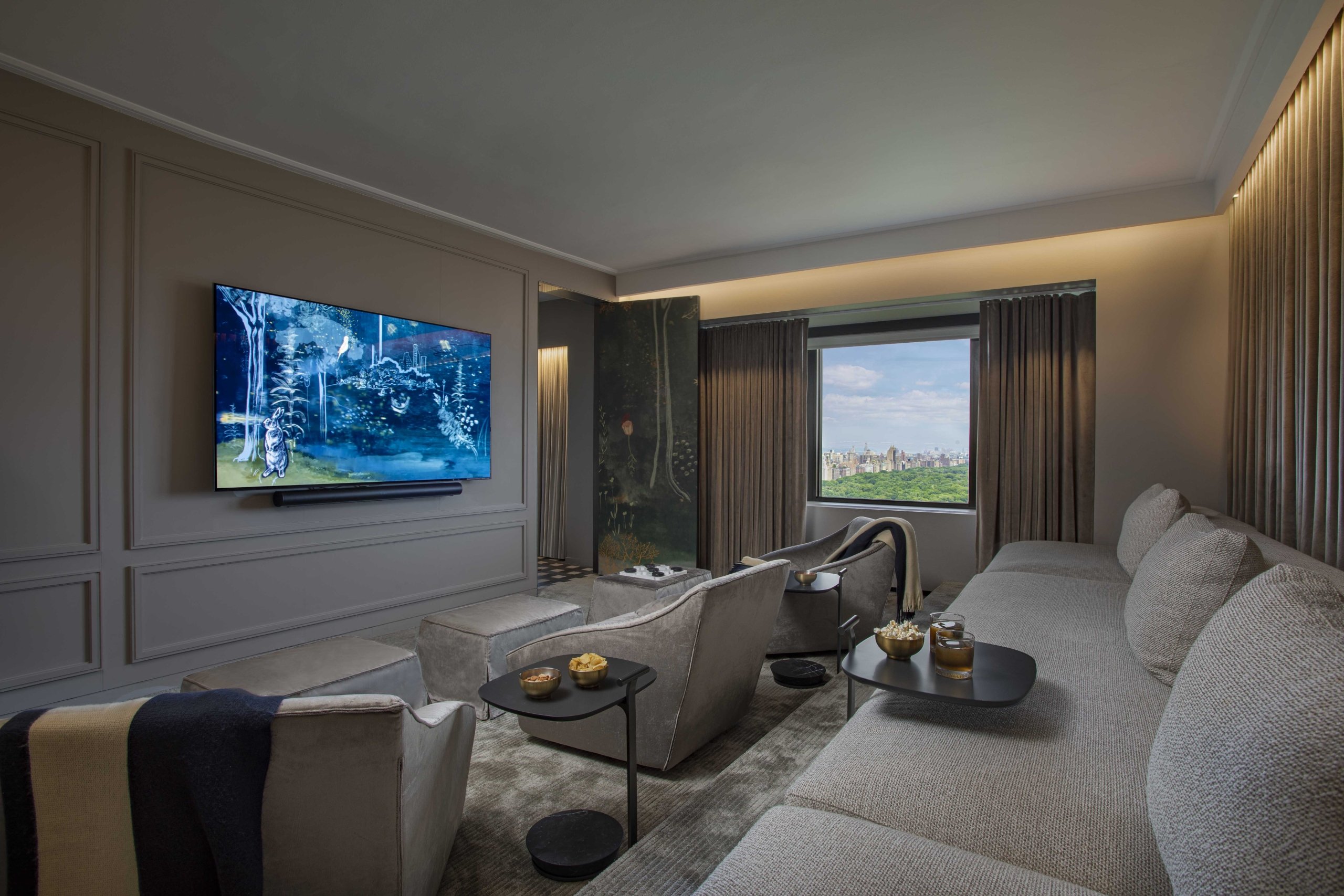 A small theatre room in a suite at Park Lane New York.