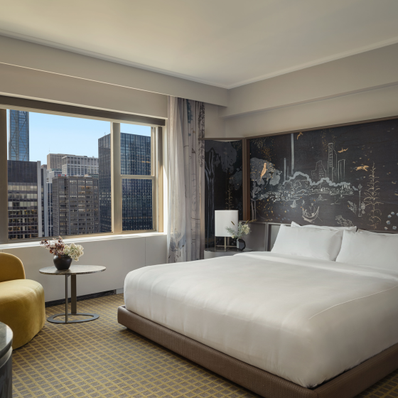 A king bed with city view at Park Lane New York.