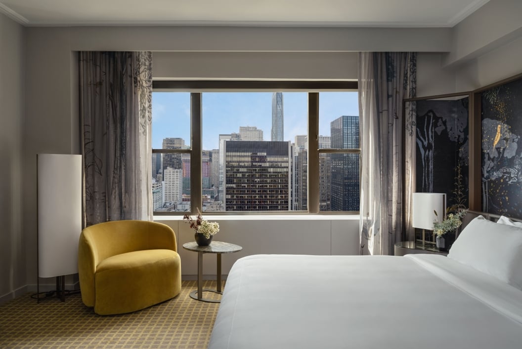 A king bed with city view at Park Lane New York.