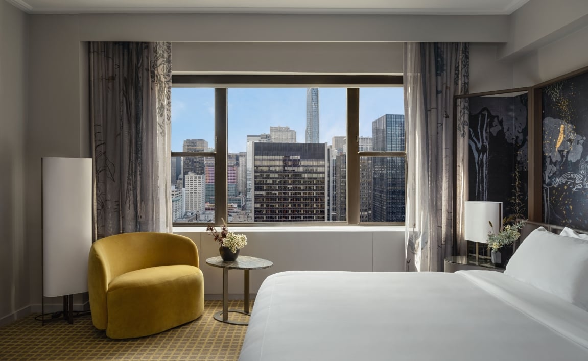 A king bed with city view at Park Lane New York.