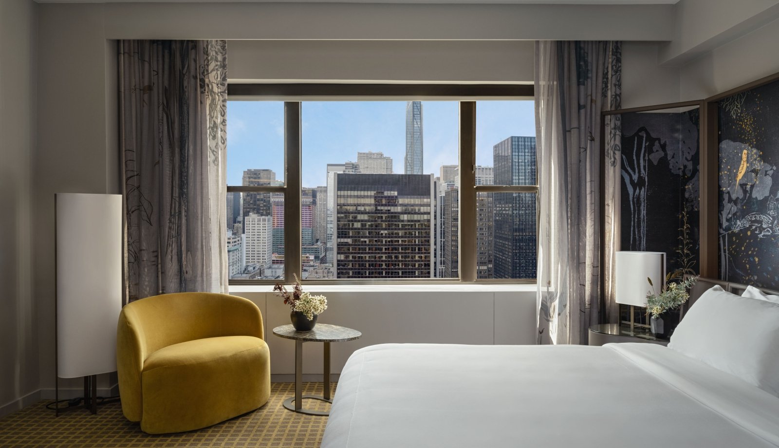 A king bed with city view at Park Lane New York.