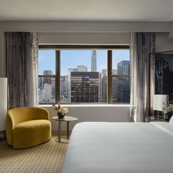 A king bed with city view at Park Lane New York.