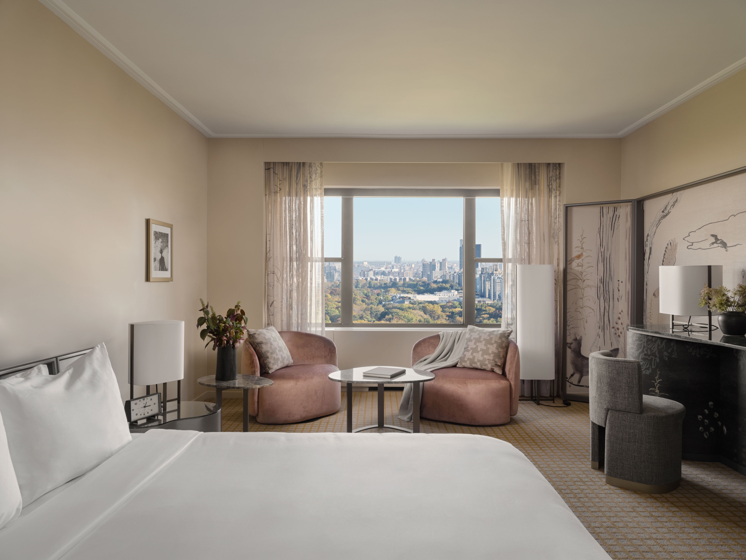 A king suite at Park Lane New York overlooking Central Park.