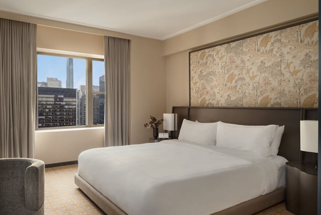 A king bed in a suite at Park Lane New York.