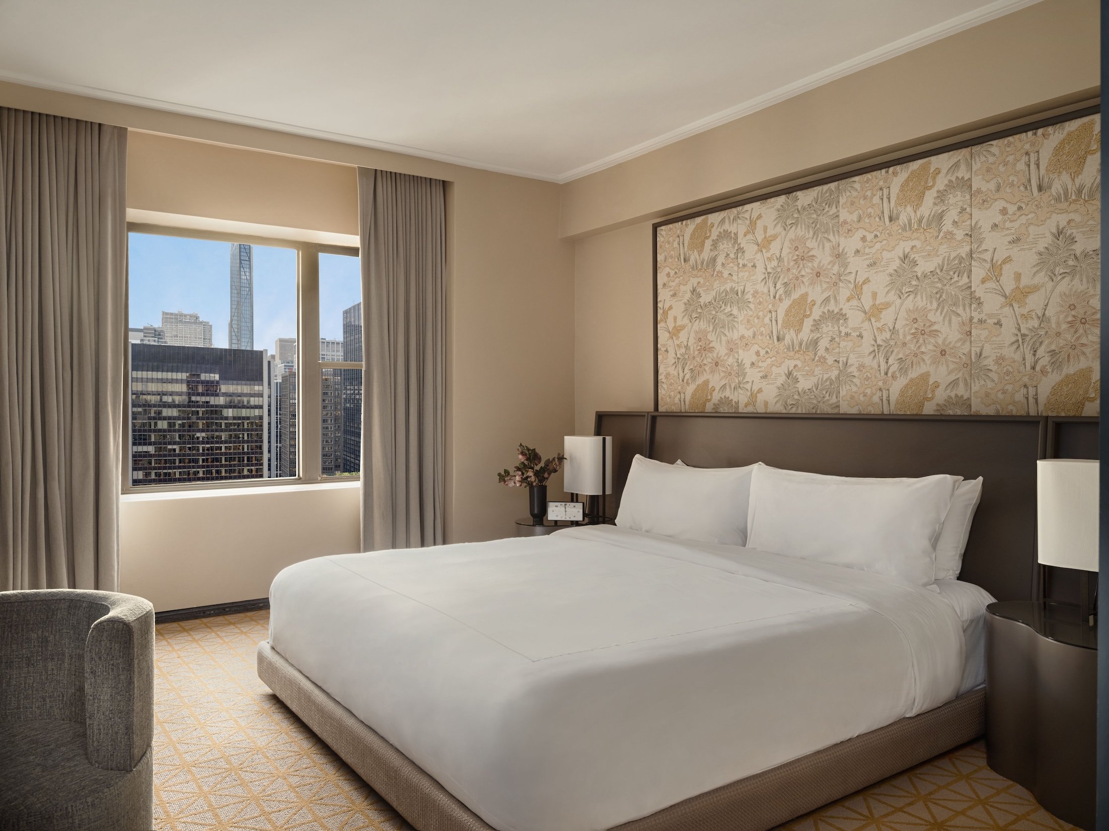 A king bed in a suite at Park Lane New York.